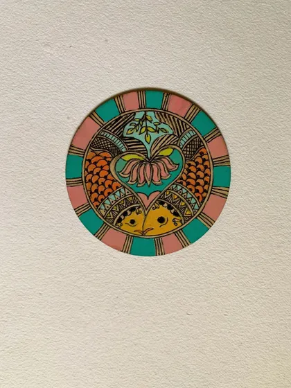A beautiful Madhubani design painted on a coaster. We encourage students to explore how these ancient motifs can adorn everyday objects, adding a touch of royal elegance to their homes.