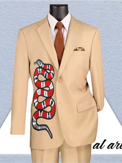This is a product view of the hand-painted snake design on a tan suit jacket. I use premium paints that adhere perfectly to different fabrics, ensuring the artwork is both vibrant and durable.