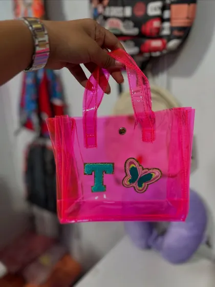 Another personalized mini tote, this time in bright pink with a 'T' initial and a butterfly patch.