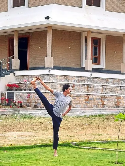 This is Trivikrama-asana, named for an incarnation of Lord Vishnu who crossed the three worlds in three steps. This advanced standing pose, which requires immense flexibility, tells the story of overcoming ego and recognizing the infinite power of divinity.