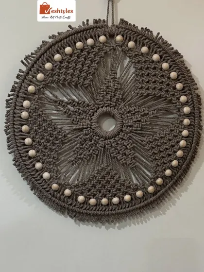 This macrame wall decor is ready to bring some boho charm to a new home. I can make this in different colors to match your decor.
