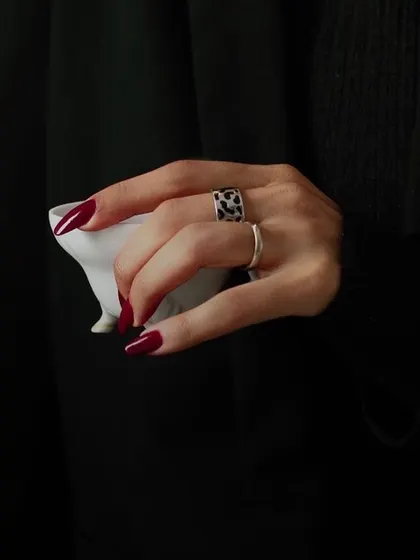 What's your nail game? A deep, rich red is always a powerful and chic choice.