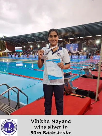 Vihitha Nayana with her silver medal in 50m Backstroke.
