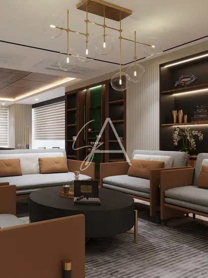 Another view of the billiard room's lounge area, showing the custom shelving and warm, layered lighting. It's a perfect space for guests to relax and watch the game.