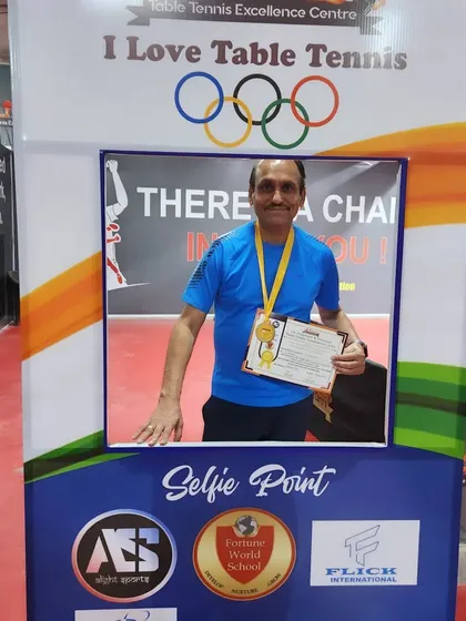 A participant enjoying the moment at our selfie point after a great tournament. Creating a memorable experience is just as important as the competition itself.