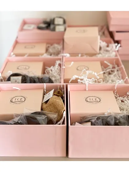 A look inside our pink baby announcement boxes. Each one is carefully packed with our delicious eggless and refined flour-free treats.