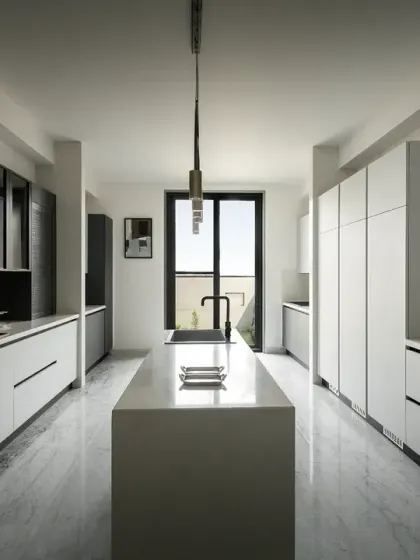 The kitchen on the ground level of The House of Dancing Screens is spacious and well-equipped. It opens into a sunlit lawn at the front, providing the ideal setting for morning tea.
