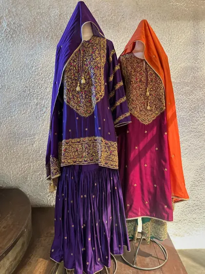 The full silhouette of these majestic sharara sets. The combination of a long kurta with a flowing sharara is a classic choice that is both elegant and comfortable for long hours of celebration.