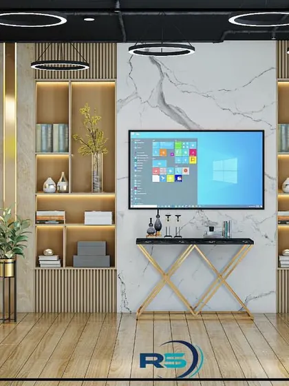 A concept for a waiting area or lounge within an office. The design features a marble-clad TV wall flanked by custom bookshelves, creating a welcoming and professional space for clients or employees.