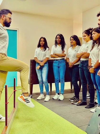 As a leader, I believe in empowering my team. Here I am teaching my colleagues about advanced physiotherapy principles to ensure we all continue to grow and provide the best care.
