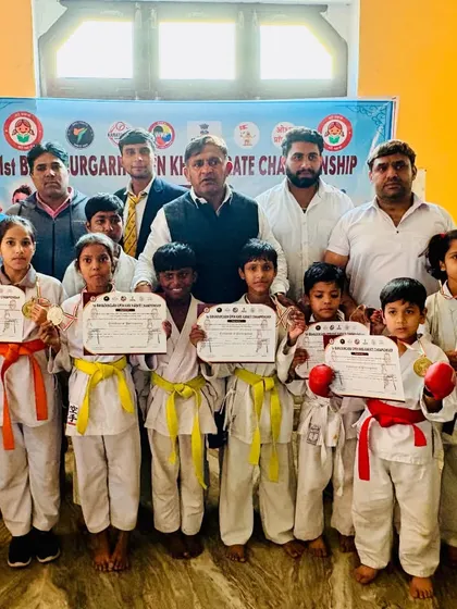 A proud lineup of my junior students, all holding their certificates and medals.