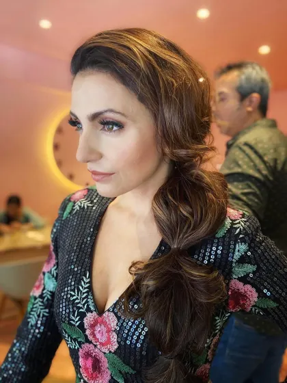 A side profile of the messy braid. This is a great way to keep long hair managed while still looking incredibly stylish.