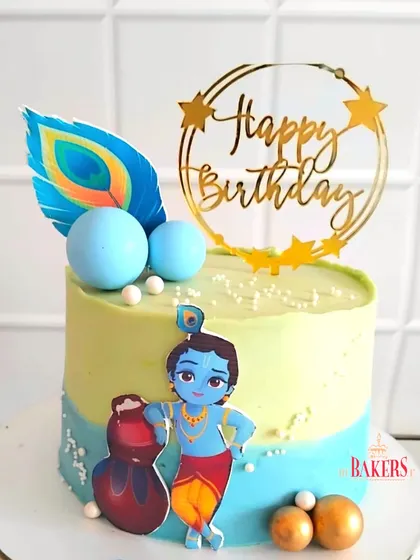 A super cute Krishna-themed cake for little Taksh’s 3rd birthday! This completely no-fondant cake features a charming illustration of Krishna, a peacock feather, and a pot of butter. The flavor was vanilla and mixed berries.