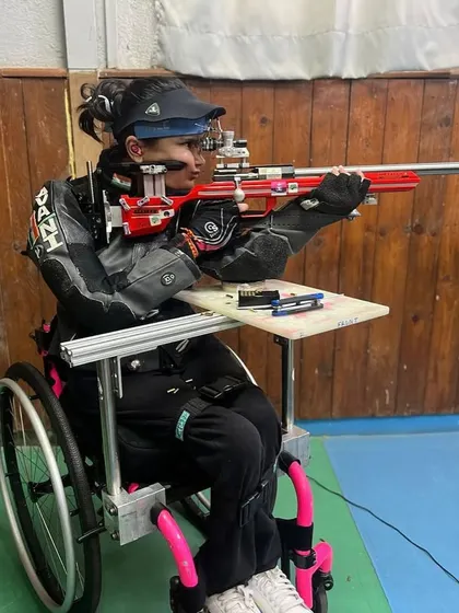 Avani Lekhara preparing her equipment for a training session. We ensure our para athletes have access to the best facilities and support.