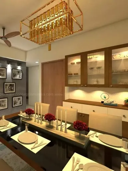 This dining room design for Candeur Carlisle features a grand chandelier and an extensive crockery unit with glass doors, perfect for entertaining.