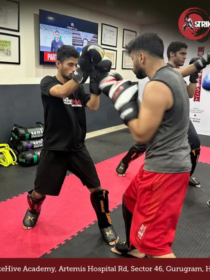 Partner drills are essential for developing timing and reflexes. Our students practice offensive and defensive striking combinations, building muscle memory and practical combat skills.
