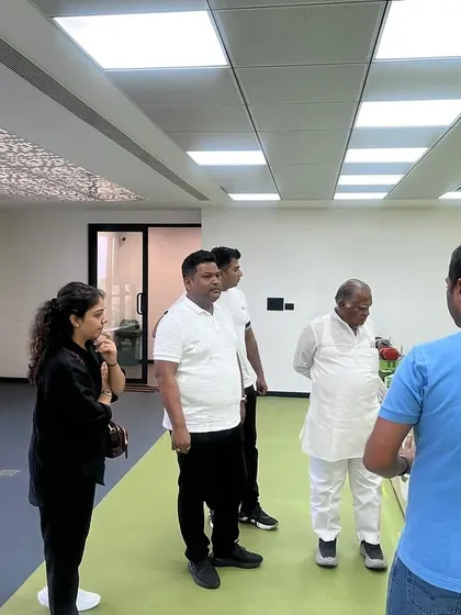 A discussion with our guests in the table tennis area, showcasing another one of the many sports we offer.