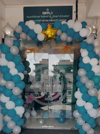 For the 4th anniversary of Ripplr, I created this balloon arch at their main entrance. The blue, white, and silver color scheme was chosen to match their corporate branding, welcoming employees and visitors to the celebration.