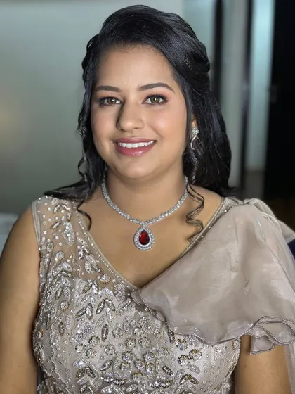 A happy and confident bride-to-be, ready for her engagement ceremony.