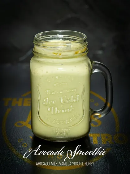 The Avocado Smoothie is a rich and creamy option packed with healthy fats. It's made with avocado, milk, vanilla yogurt, and honey, making it a perfect post-workout recovery drink.