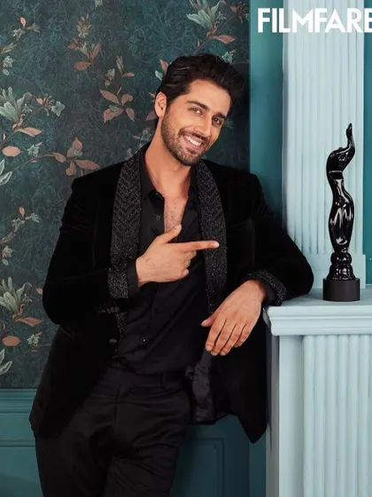 Actor Ehan Bhat celebrating his Filmfare award win in our black velvet tuxedo. The textured lapel adds a modern touch to a classic garment, fit for a star of the night.