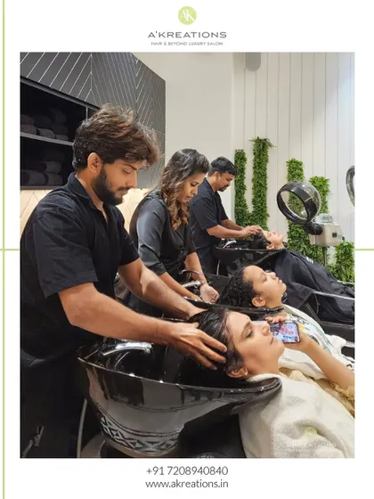 Indulge in a soothing hair wash day at our salon. This photo shows our team taking care of multiple clients, ensuring everyone gets the pampering they deserve.
