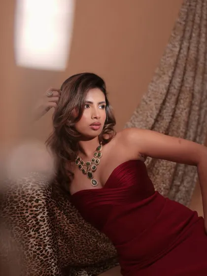 The influencer Aashna Hegde looking poised and perfect in my Mehrani Necklace Set, paired with a stunning red gown.