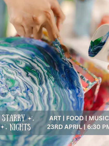 The magic of acrylic pouring is perfect for a starry night. This close-up shows the beautiful, fluid patterns that can be created. It's a fun and unpredictable art form that everyone enjoys.