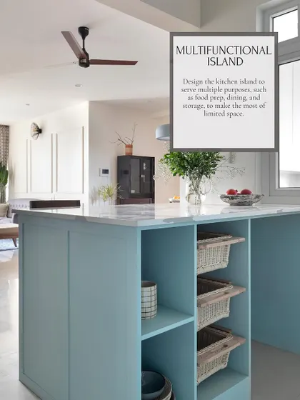 A multifunctional island can serve as a food prep area, a casual dining spot, and an extra storage hub. This light blue island includes open shelving and wicker baskets, making the most of a compact space.