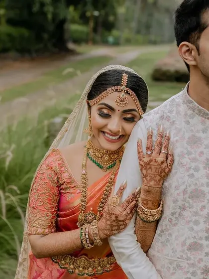A beautiful, candid moment between the bride and groom. We use natural surroundings and soft light to create portraits that feel both intimate and timeless.