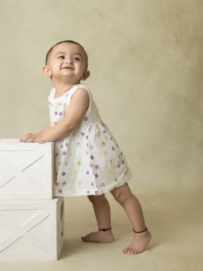 A collection of simple, classic portraits of twin babies. Without props or themes, their individual expressions and connection are beautifully highlighted.