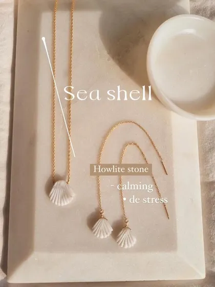 Inspired by the sea, this is my Howlite shell collection. The set includes a delicate shell pendant necklace and matching 'Sui Dhaga' threader earrings, both designed to bring a sense of calm and de-stress the soul.