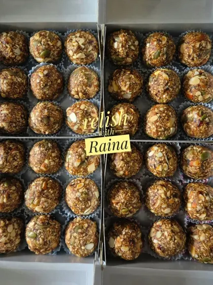 Two boxes of my Protein Laddoos, a popular choice for Rakhi gifting. These are made with oats, almonds, peanuts, seeds, and dates, making them a thoughtful and healthy gift.