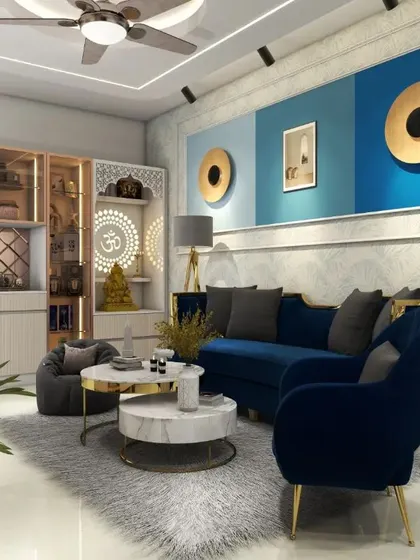 A living room designed with a bold blue color scheme. The space includes a custom bar and crockery unit with a dedicated pooja niche, showcasing our ability to create multi-functional, personalized living areas.