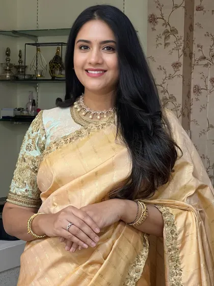 This client is glowing with happiness. The makeup is natural and fresh, enhancing her beautiful smile.