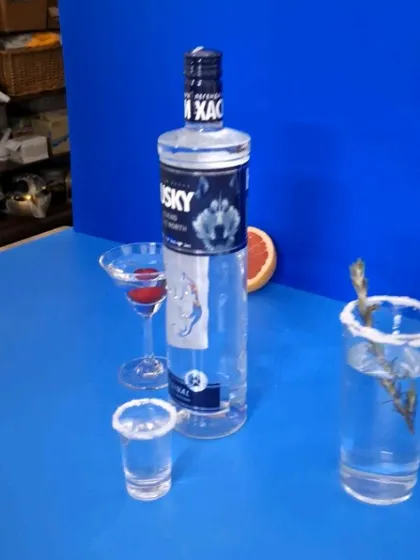 A behind-the-scenes look at the styling for the blue-themed Husky Vodka group shot.
