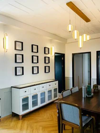 Please comment below if you are one of those who prefer eating at the dining table. A killer dining space we did, with a beautiful white credenza and herringbone wood floors.