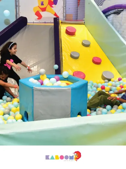 The ball pit is a place for both high-energy fun and quiet exploration.