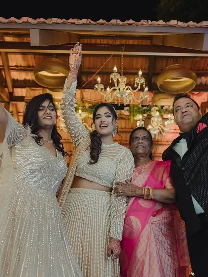 A heartwarming photo of the bride celebrating with her family on the dance floor. These multi-generational moments of joy are some of the most precious memories to capture.