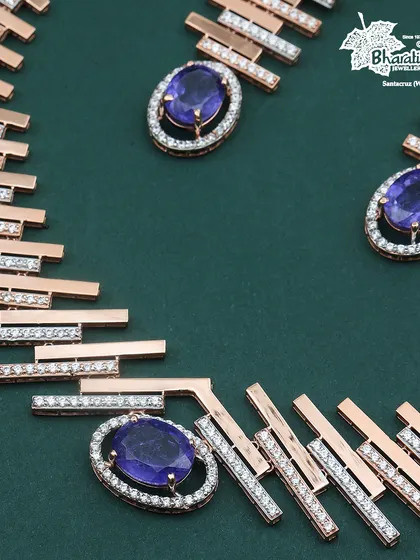 A composition of the Royal Blue set, showing the relationship between the necklace and earrings.