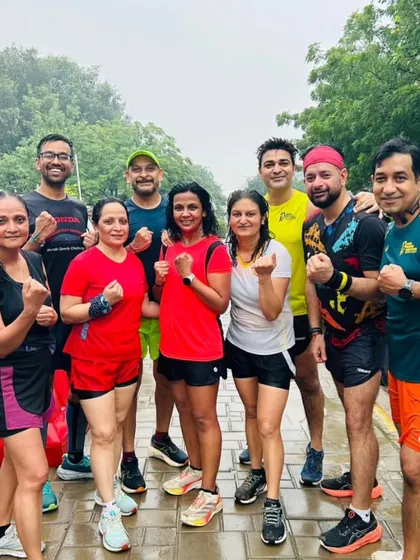 The tribe after a rainy day run. Bad weather is just another challenge to conquer. We show up, no matter what.