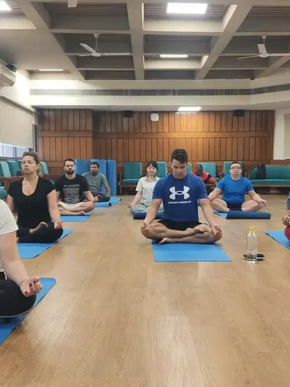 A wider view of the meditation practice with our international students. We guide them to find stillness and connect with their inner selves.