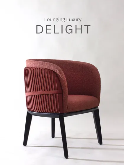 Lounging luxury delight. This armchair is designed to be as comfortable as it is beautiful, with a deep seat and a supportive, curved back.