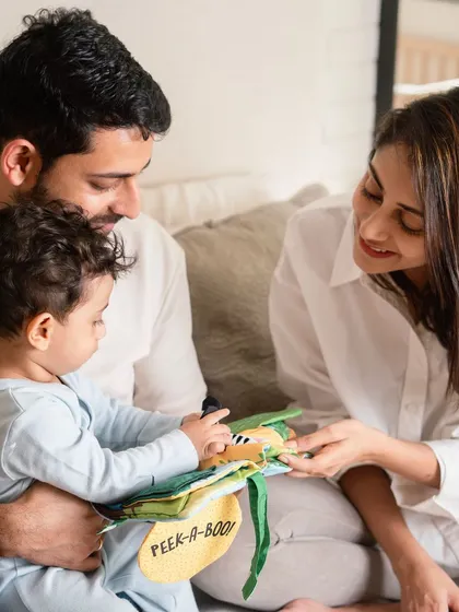 Magical mornings at home. A lifestyle session is about documenting your family's routine, like reading a favorite book together in the morning light.