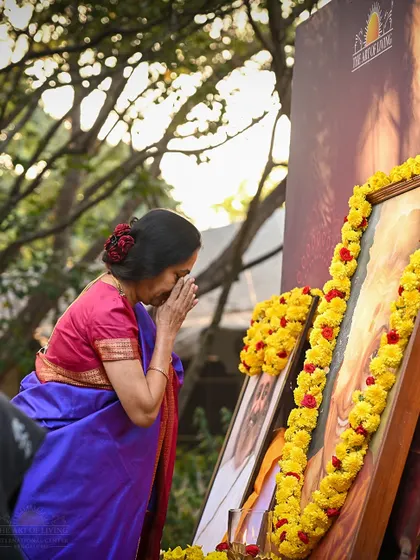 A devotee offers her respects on the birthday of my mother, Vishalakshi Amma. It was a day filled with love, gratitude, and togetherness.