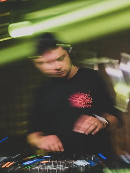 A motion blur shot capturing the fast-paced energy of a club night. I'm always moving, always mixing, and always in the zone.