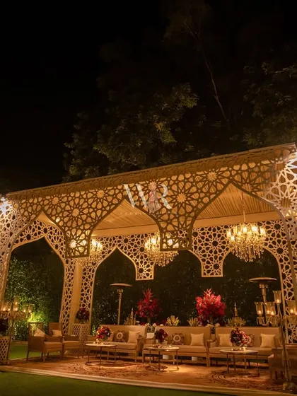 A wide shot of the magnificent jaali structure, which served as a semi-enclosed lounge. This architectural element was a major focal point, demonstrating my ability to build custom, high-impact structures.