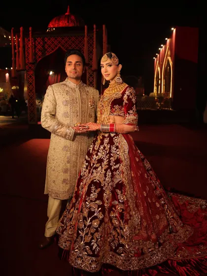 The complete royal look for their reception. The makeup and styling were done to complement the grandeur of the setting and her magnificent bridal outfit.