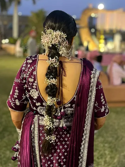 A beautiful floral braid for a wedding guest. This hairstyle is traditional and looks stunning with ethnic wear.
