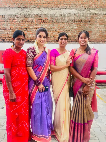 A group photo with clients. I enjoy draping for family members of all ages, helping everyone feel special and look their best for the event.